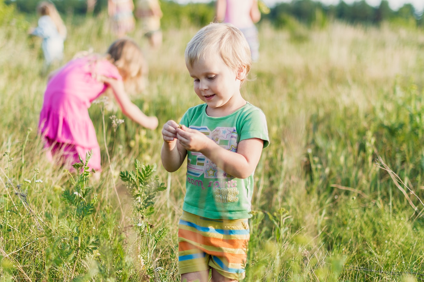Young child playing outdoors