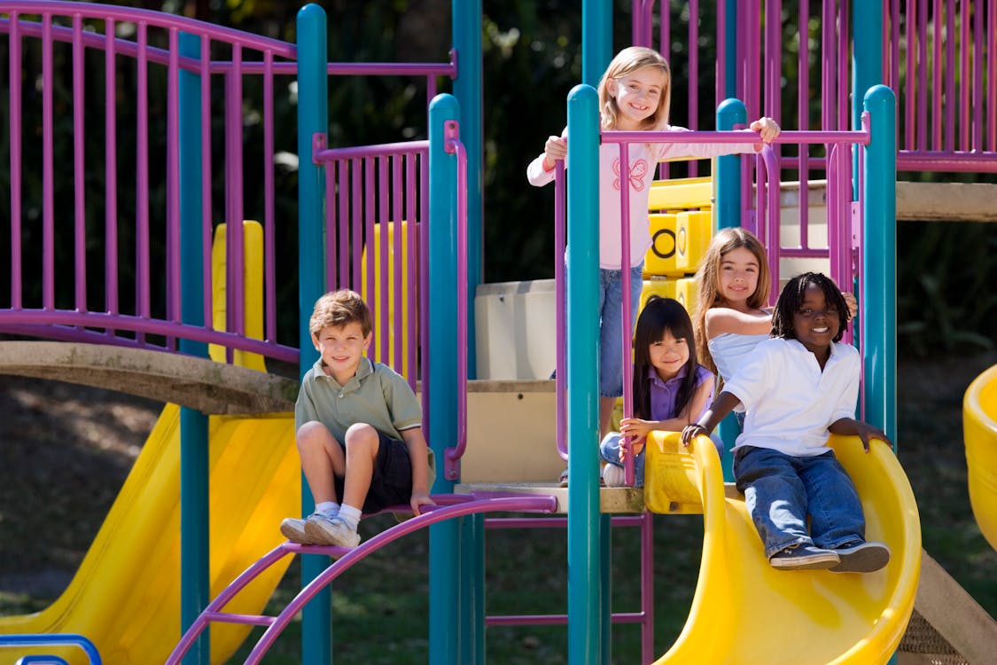 Families playing together outdoors in a park